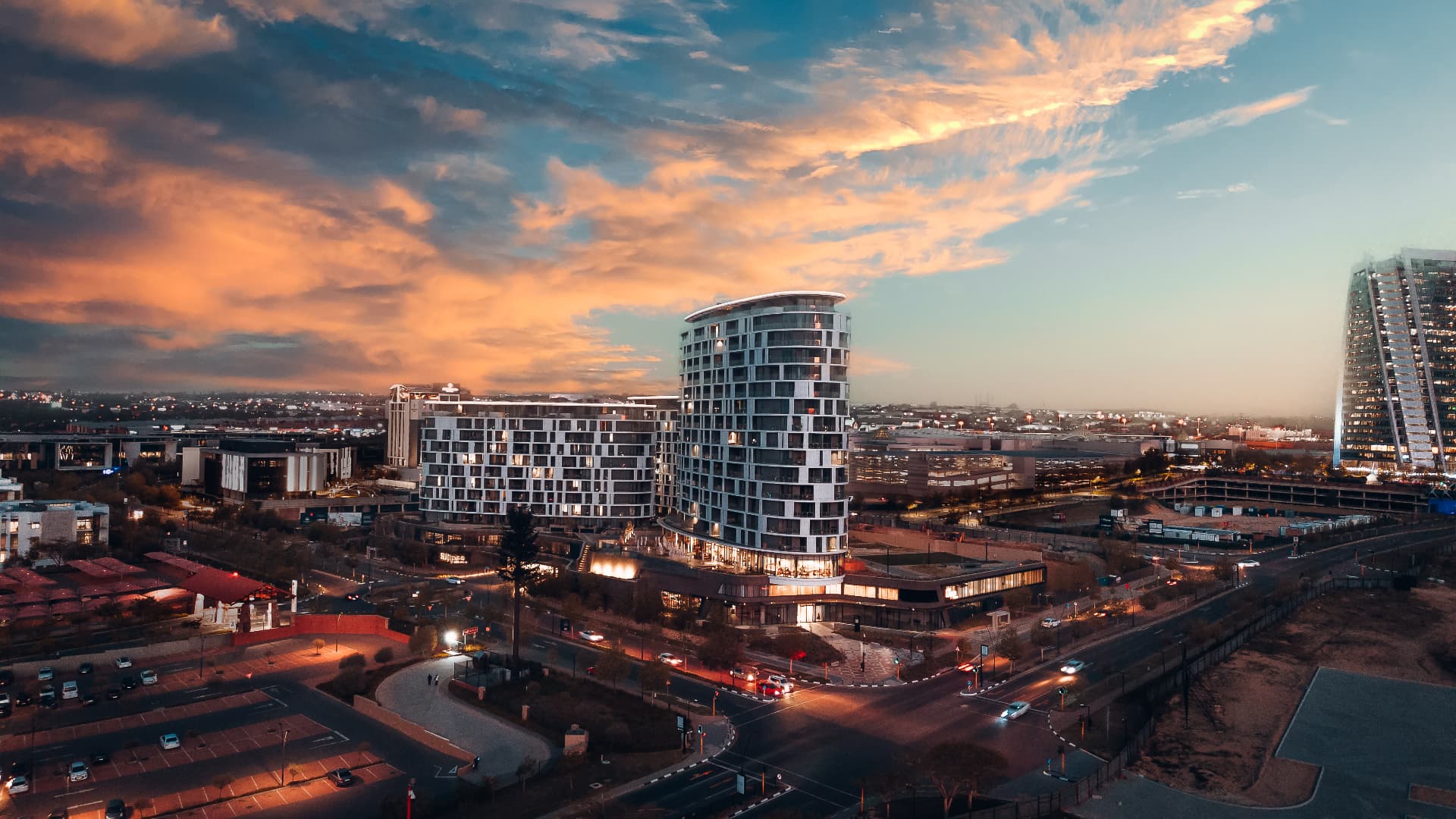 Aerial view of the Tricolt Ellipse building in Johannesburg at sunset
